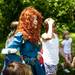 Princess Merida leads a group of kids around the Wee Folks play area at the Celtic Festival on Saturday, July 13. Daniel Brenner I AnnArbor.com